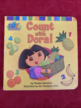 Load image into Gallery viewer, Count with Dora! : A Counting Book in Both English and Spanish by Phoebe...